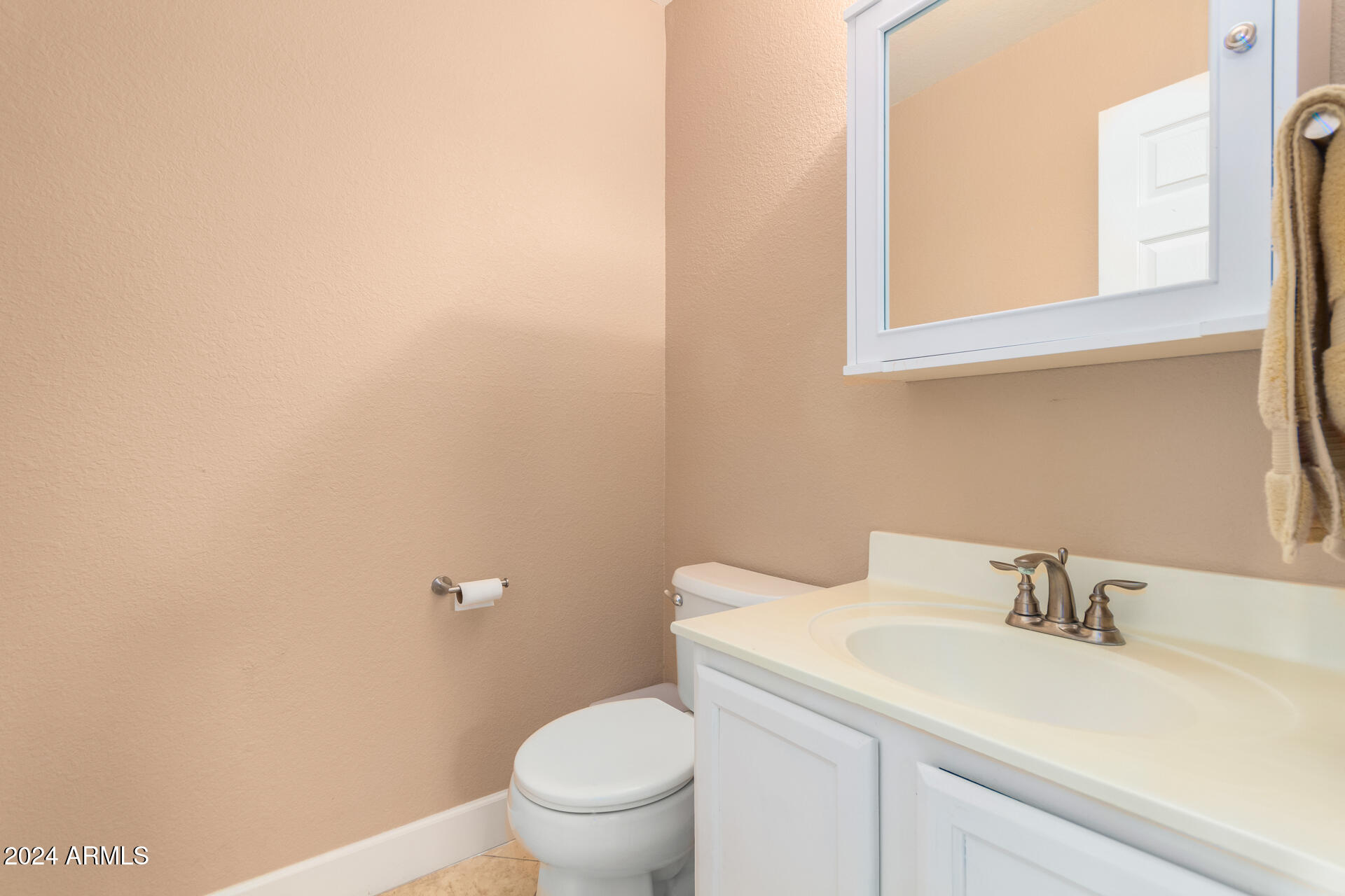 1836 North Stapley Drive, Unit 102 Mesa, AZ 85203 - Photo 18 of 34 a bathroom with a sink and a toilet