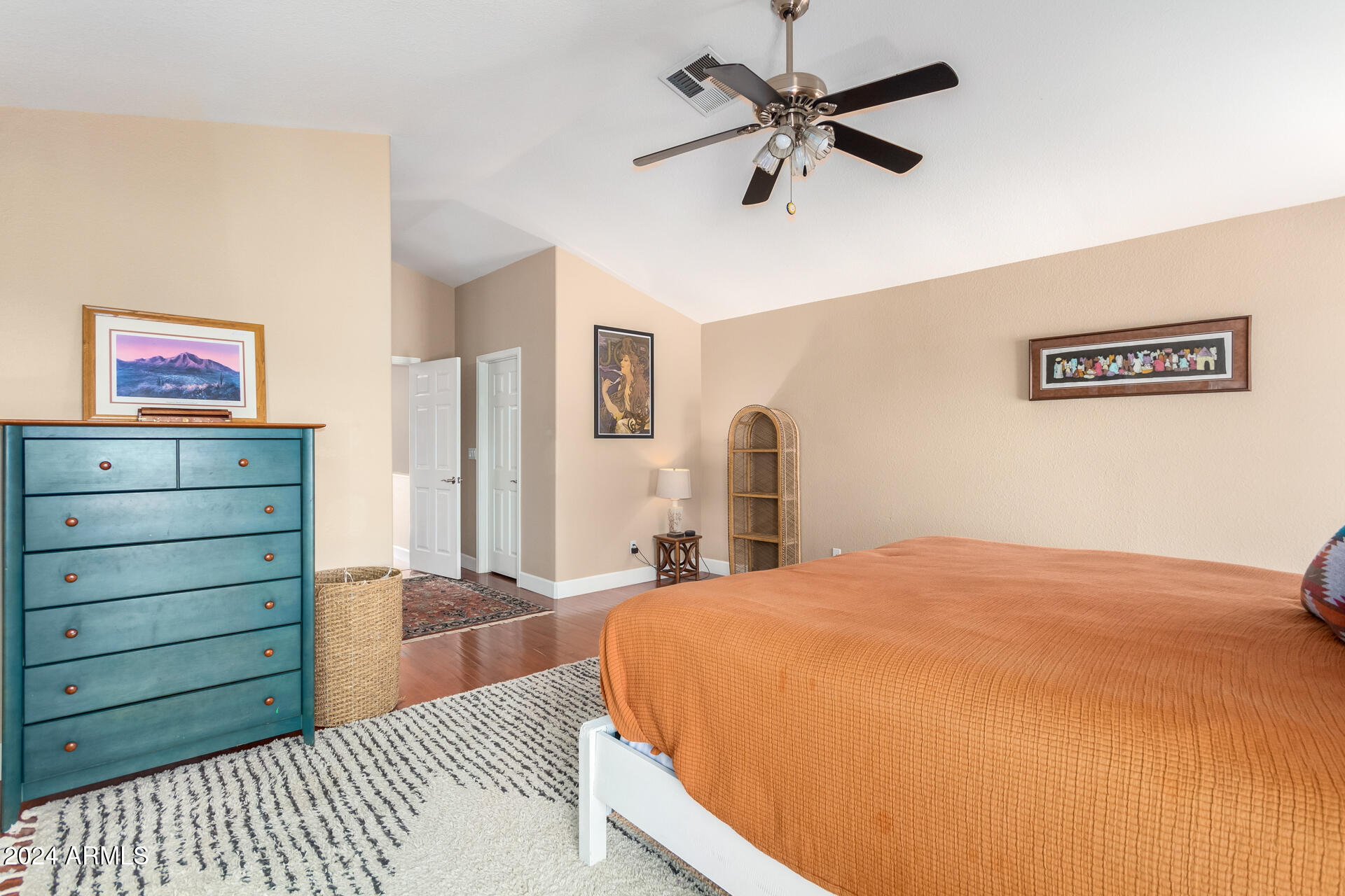 1836 North Stapley Drive, Unit 102 Mesa, AZ 85203 - Photo 22 of 34 a bedroom with a bed and a dresser