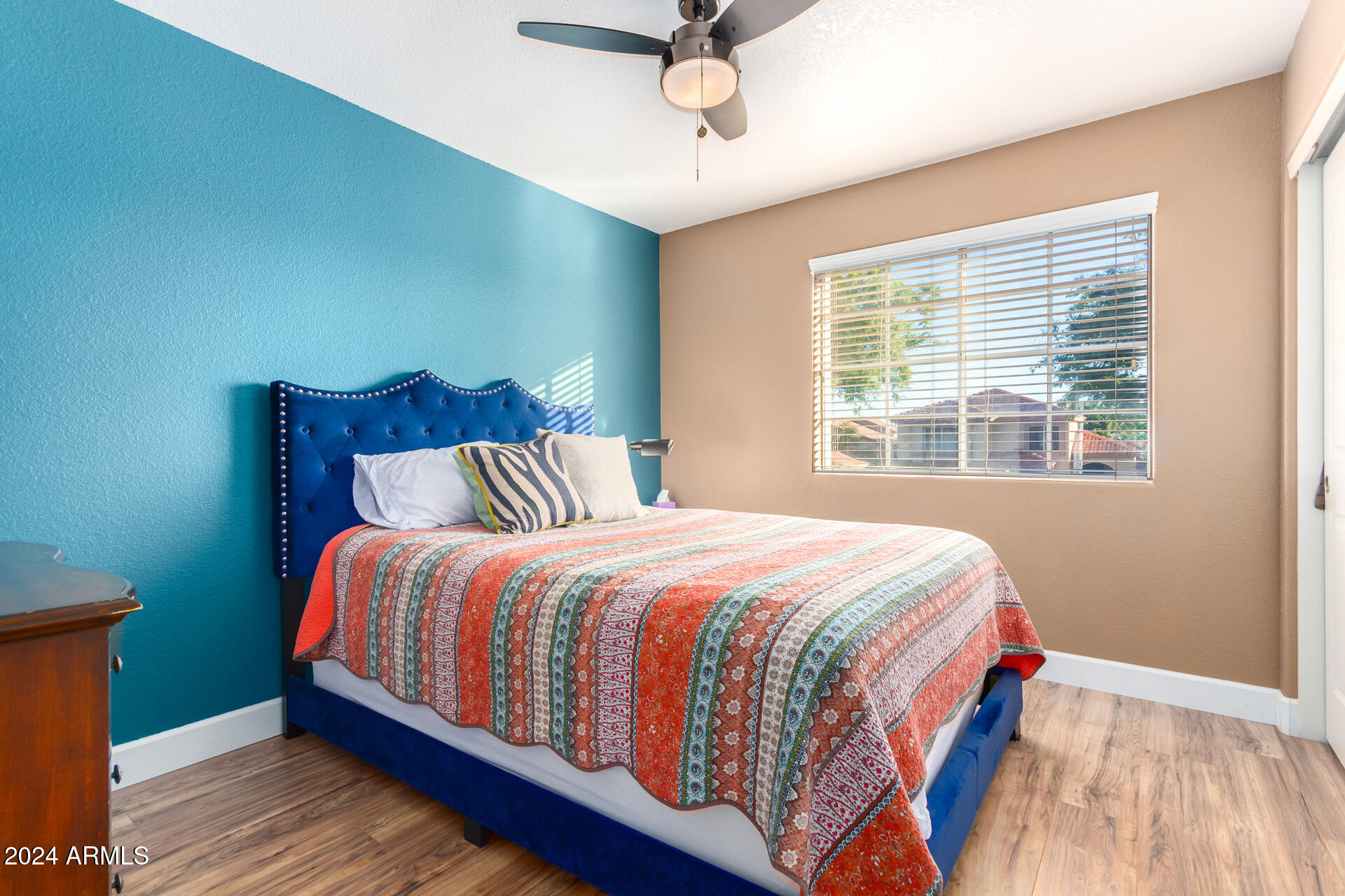 1836 North Stapley Drive, Unit 102 Mesa, AZ 85203 - Photo 25 of 34 a bedroom with a bed and window