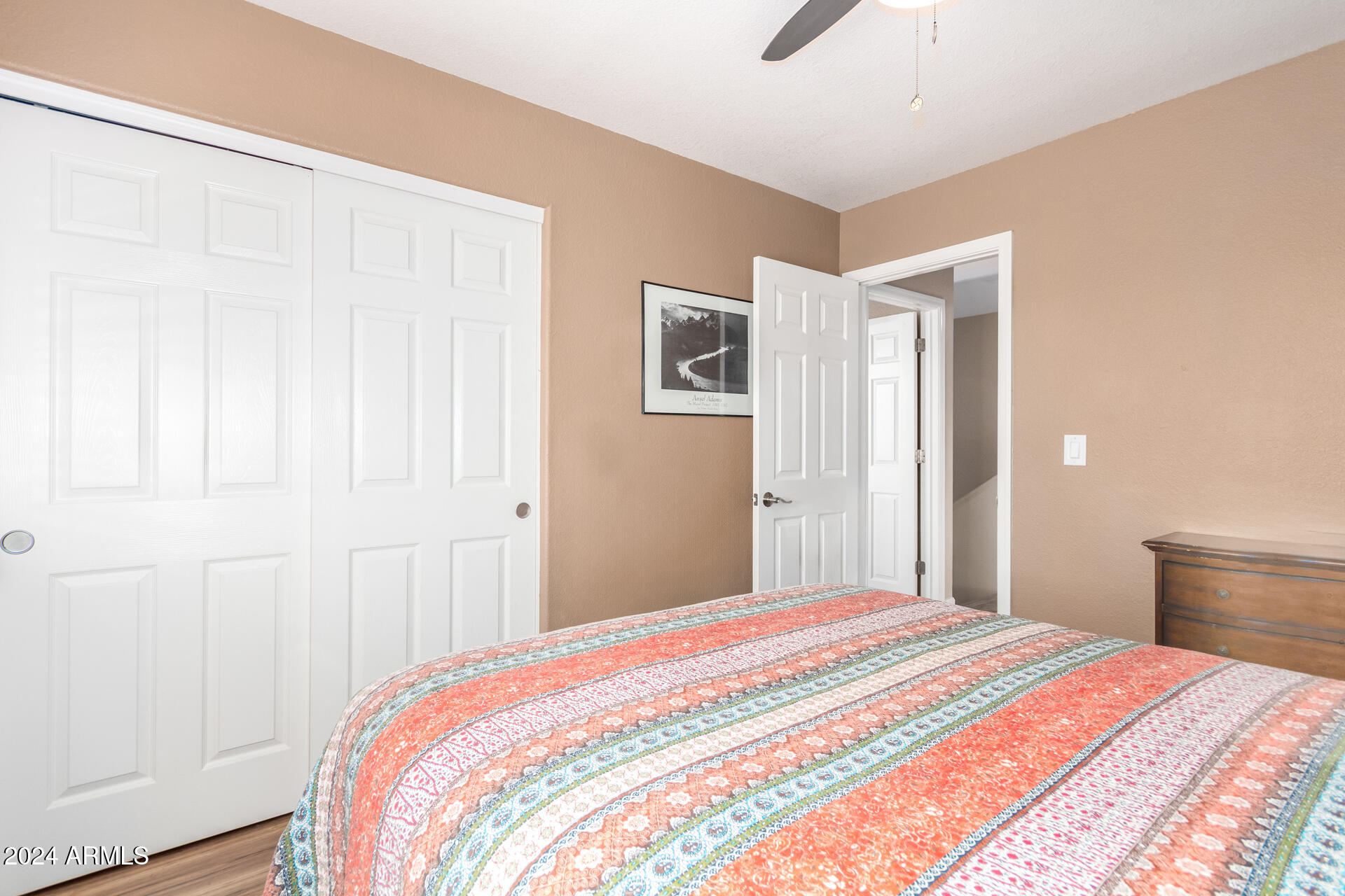 1836 North Stapley Drive, Unit 102 Mesa, AZ 85203 - Photo 27 of 34 a bedroom with a bed and a window