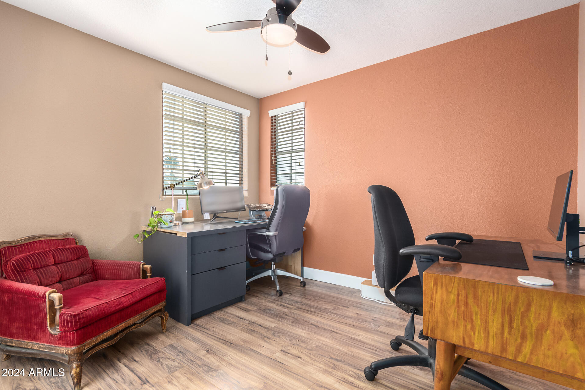 1836 North Stapley Drive, Unit 102 Mesa, AZ 85203 - Photo 28 of 34 a view of a workspace with furniture and a window