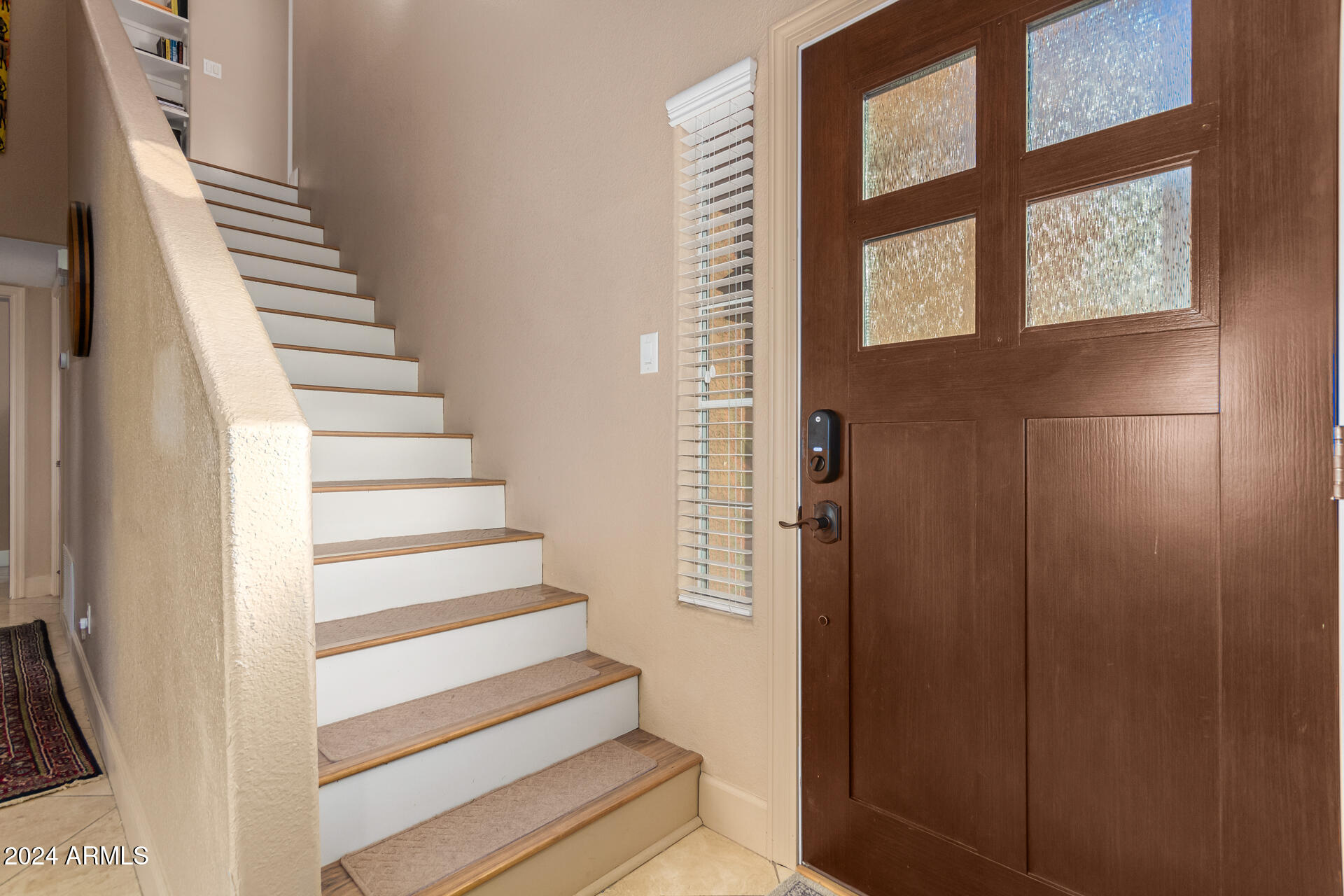 1836 North Stapley Drive, Unit 102 Mesa, AZ 85203 - Photo 4 of 34 a view of entryway and hall with wooden floor