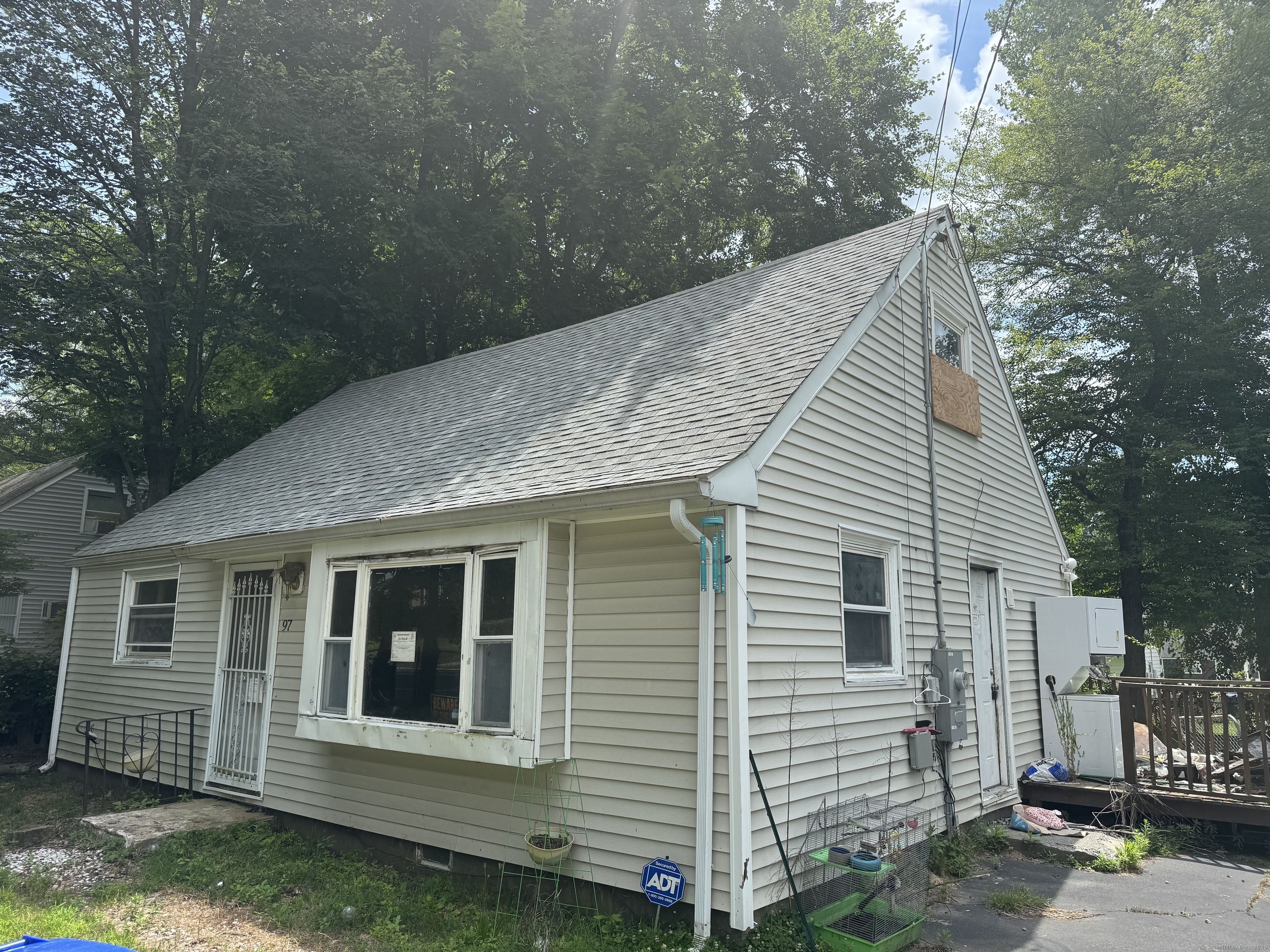 97 East Burnham Street Bloomfield, CT 06002 - Photo 2 of 7 a view of a house with a yard