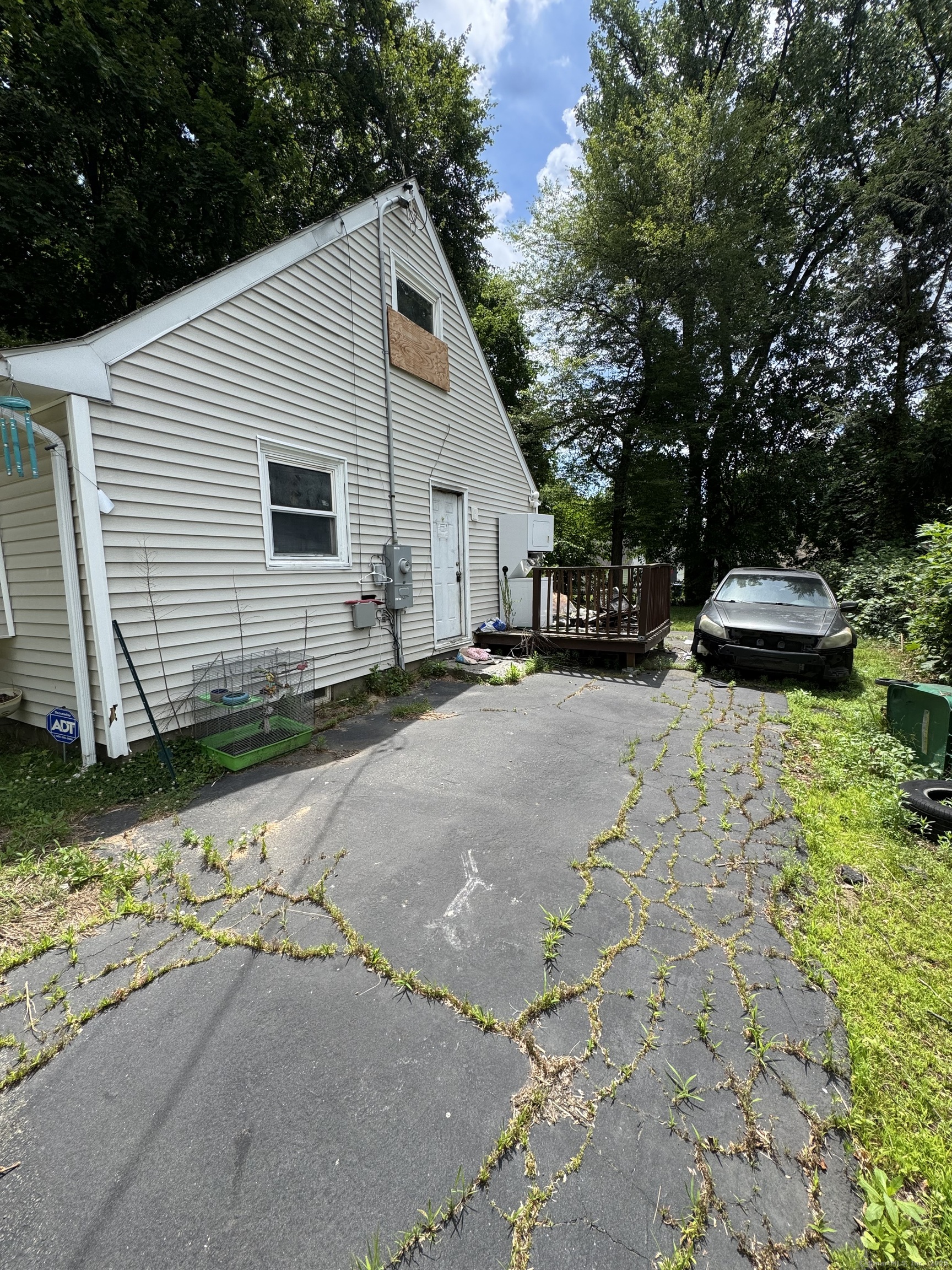 97 East Burnham Street Bloomfield, CT 06002 - Photo 5 of 7 a view of a white house with a yard