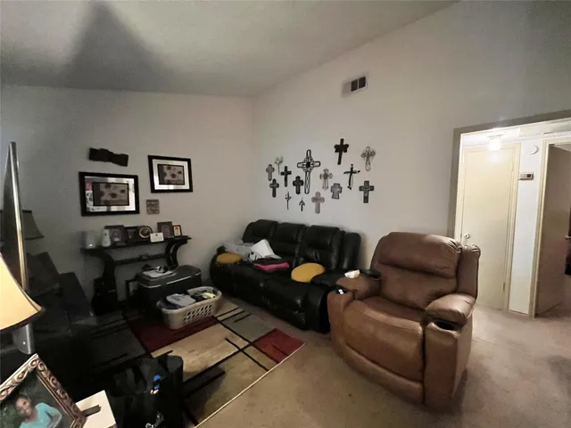 a living room with furniture and a couch