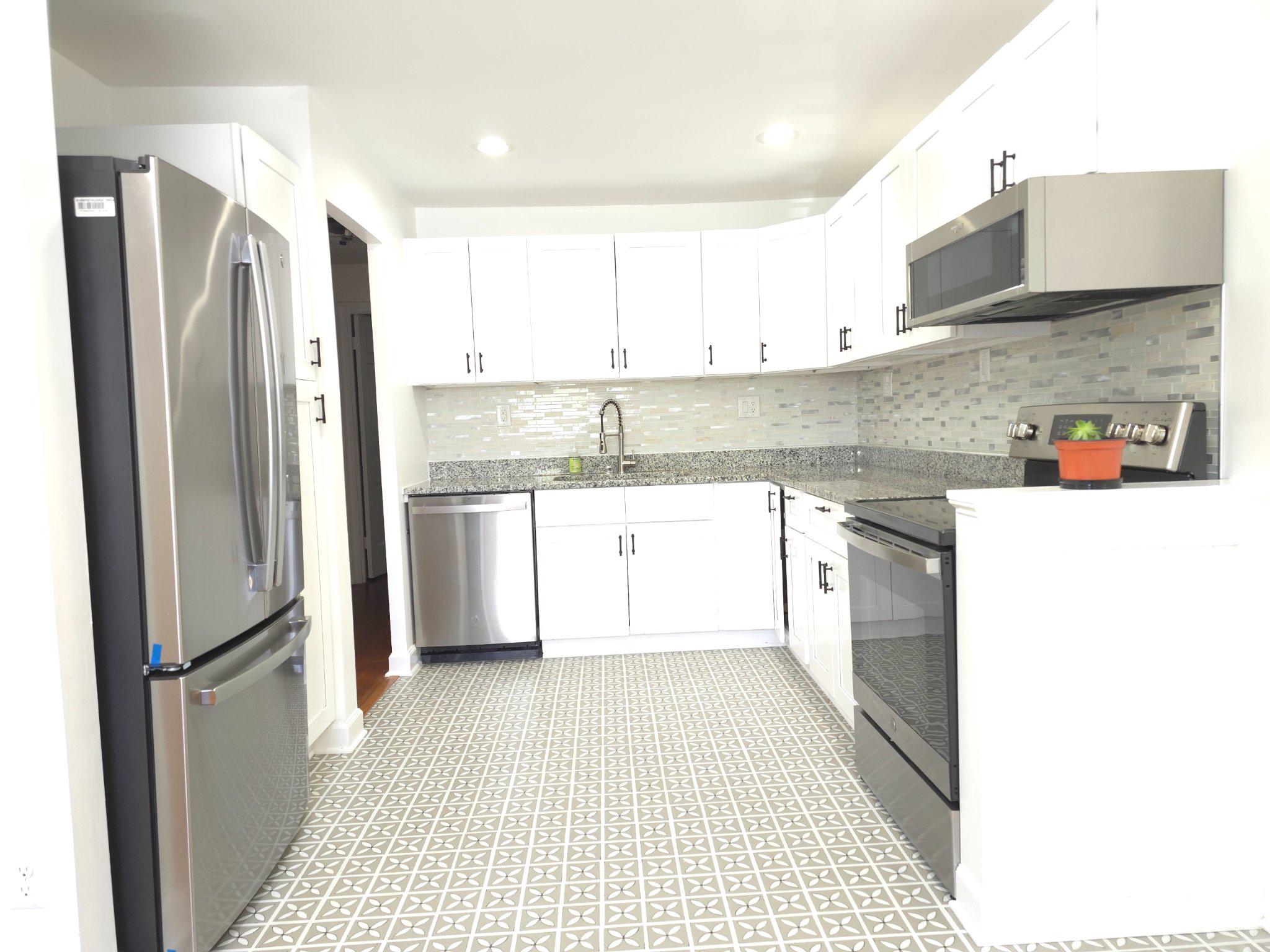 2209 Quinton Road Silver Spring, MD 20910 - Photo 13 of 46 Modern kitchen with stylish finishes.
