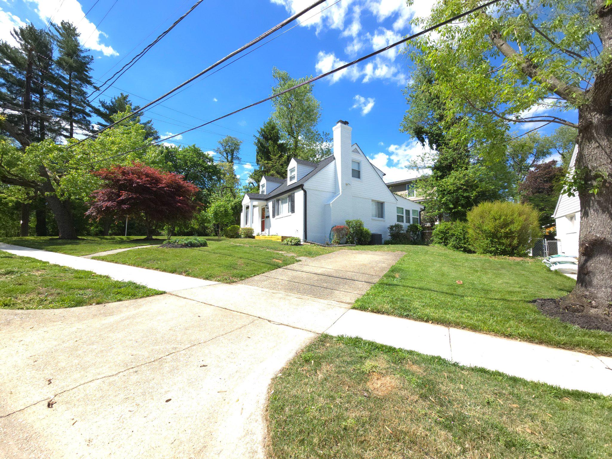 2209 Quinton Road Silver Spring, MD 20910 - Photo 3 of 46 Charming home amidst lush greenery.