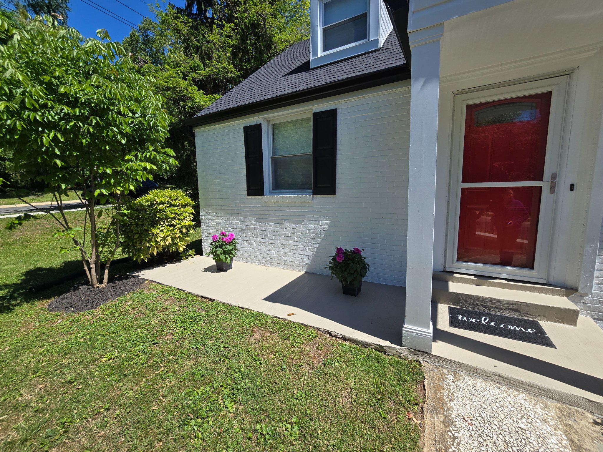 2209 Quinton Road Silver Spring, MD 20910 - Photo 4 of 46 Charming entry with vibrant blooms.