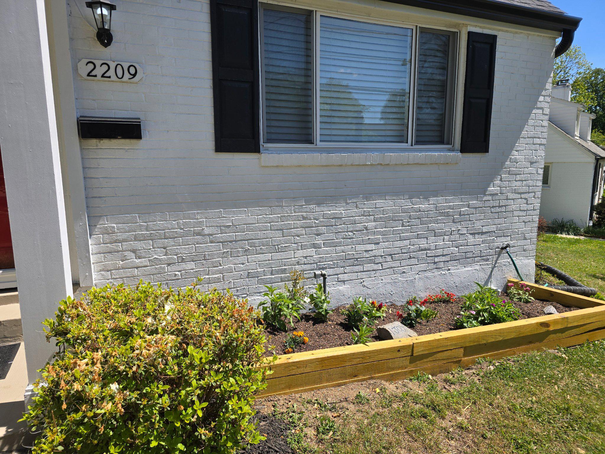 2209 Quinton Road Silver Spring, MD 20910 - Photo 5 of 46 Curb appeal with vibrant blooms.