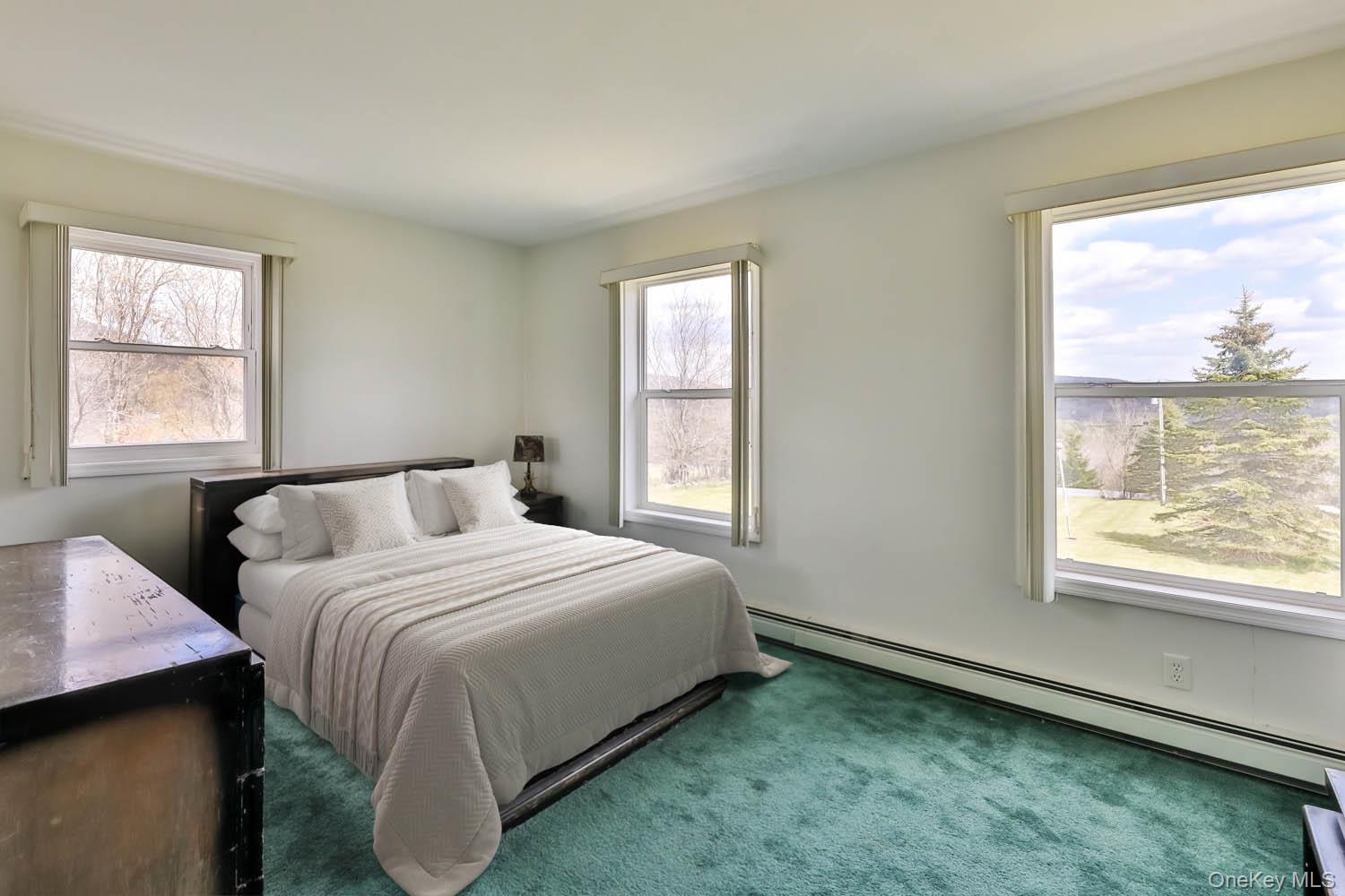 559 Case Road Ashland, NY 12496 - Photo 21 of 33 a bedroom with a bed and window