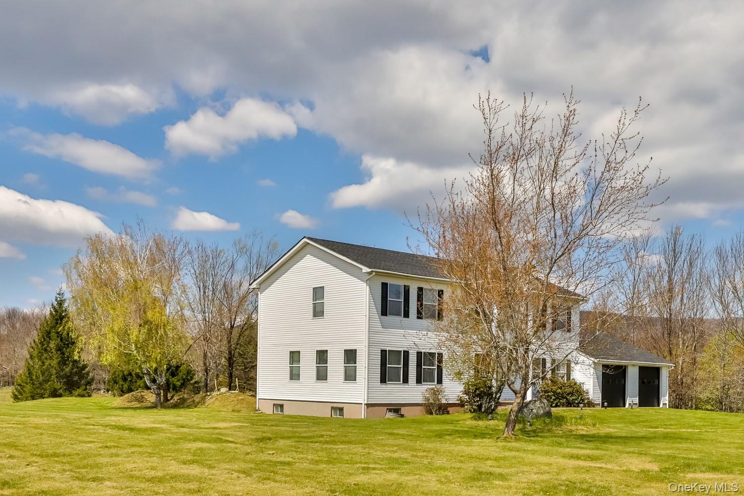 559 Case Road Ashland, NY 12496 - Photo 3 of 33 a large white building with a swimming pool