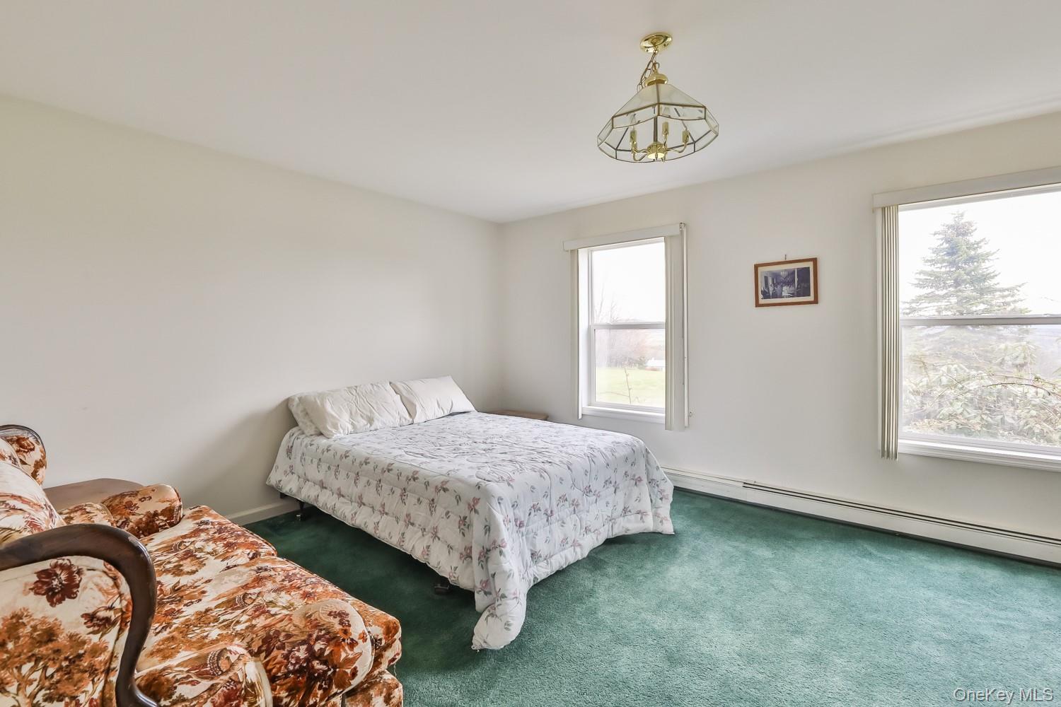 559 Case Road Ashland, NY 12496 - Photo 7 of 33 a bedroom with double bed and a window