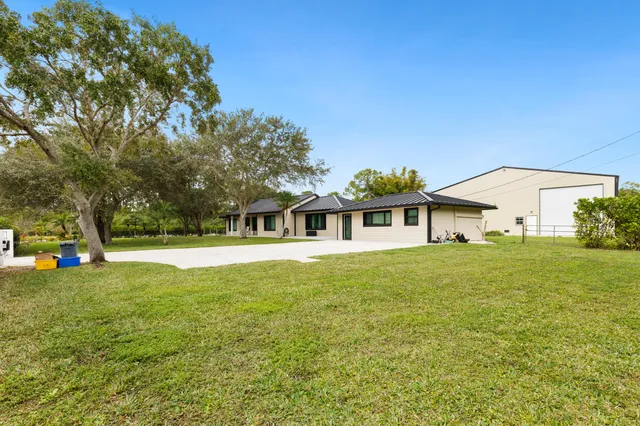 $1,200,000 | 17975 89th Place North, The Acreage, FL 33470