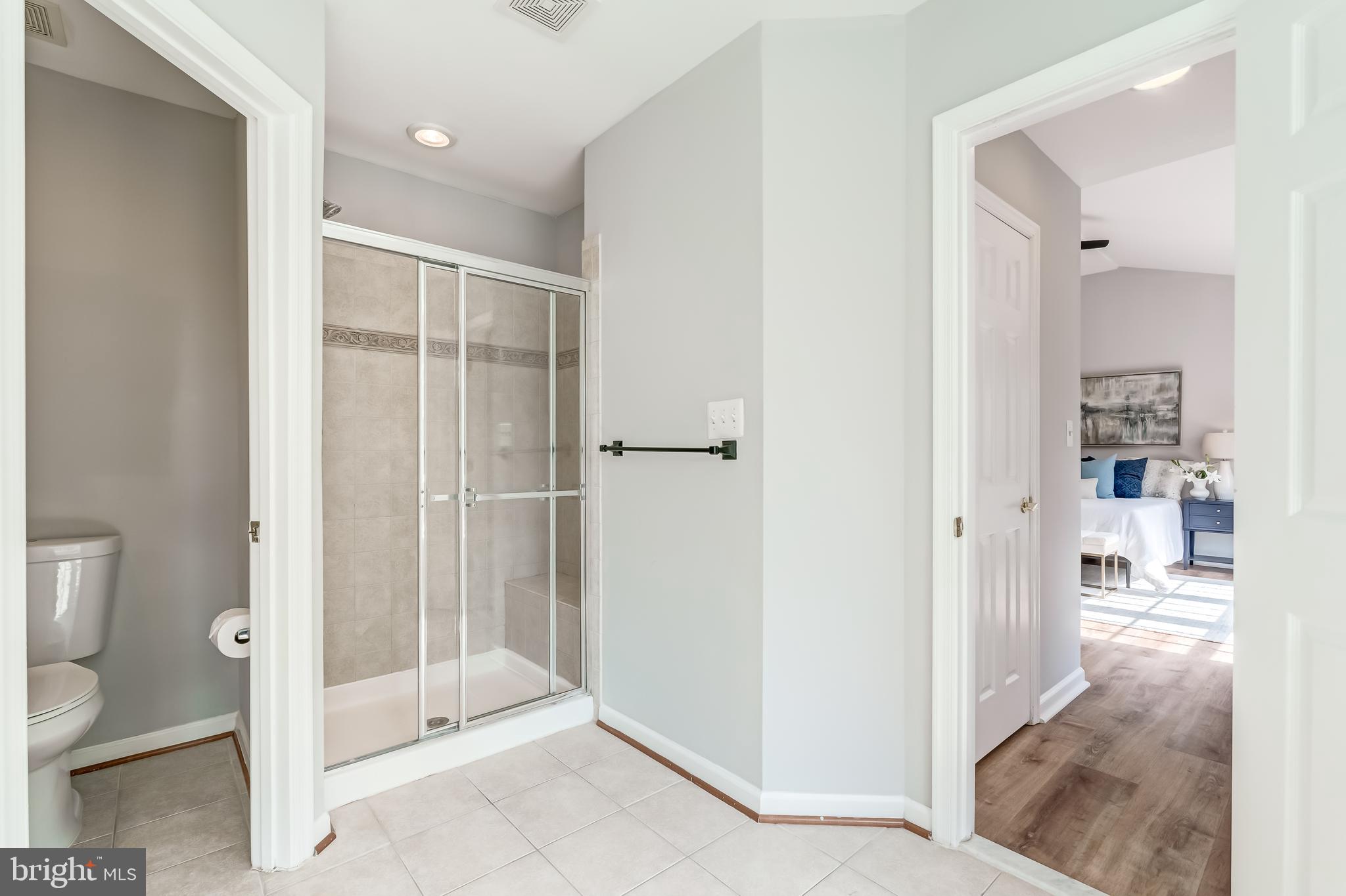 19111 Chartier Drive Leesburg, VA 20176 - Photo 25 of 68 a bathroom with a shower and a toilet