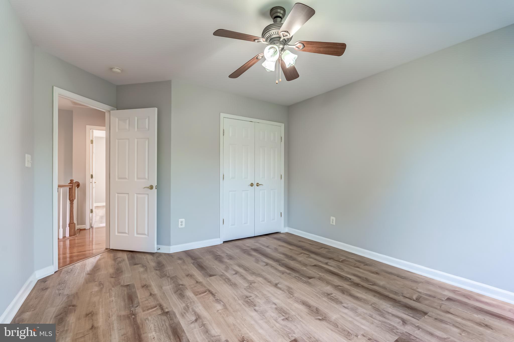 19111 Chartier Drive Leesburg, VA 20176 - Photo 27 of 68 a view of empty room with a ceiling fan