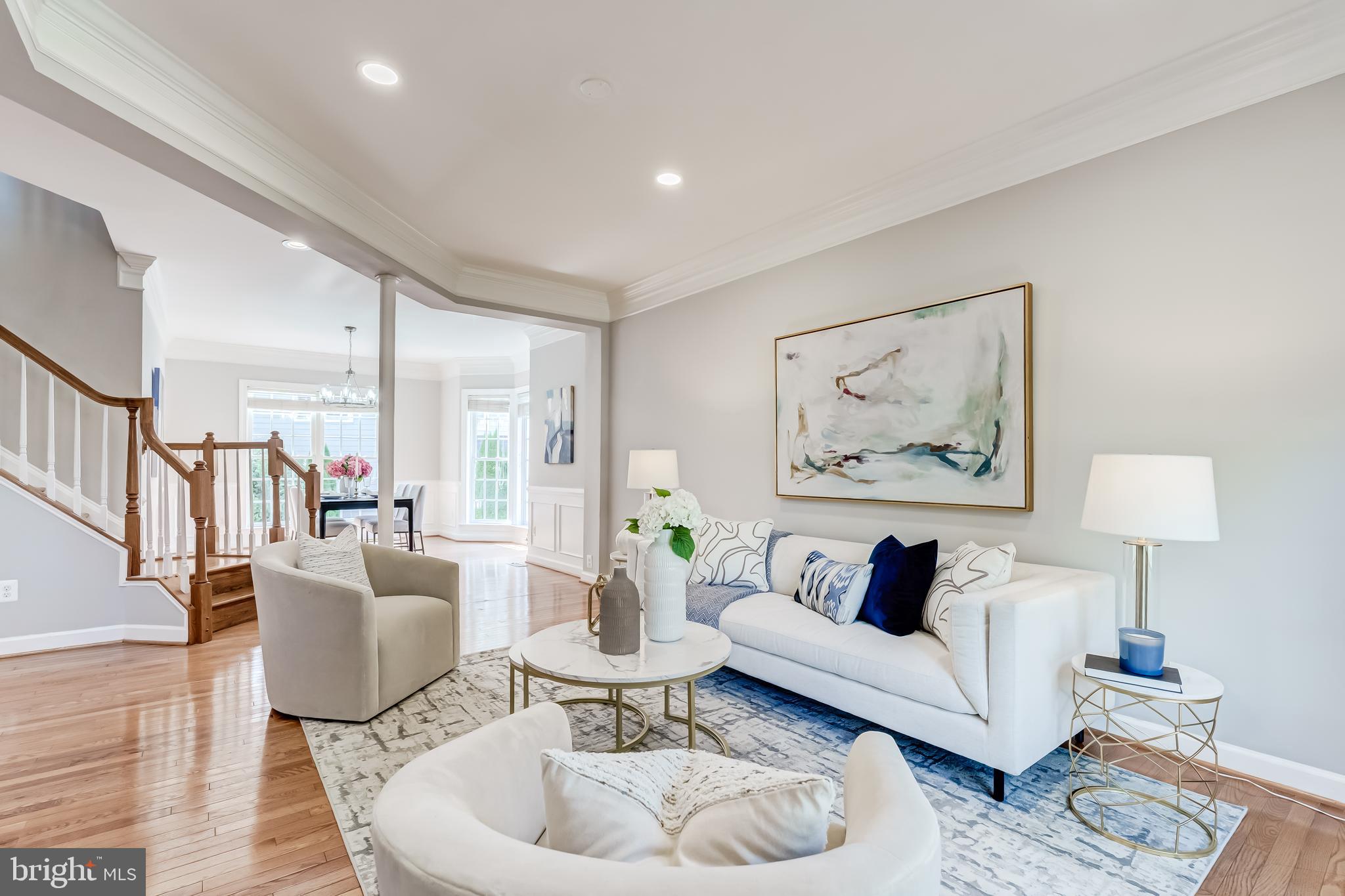 19111 Chartier Drive Leesburg, VA 20176 - Photo 5 of 68 a living room with furniture and a painting on the wall
