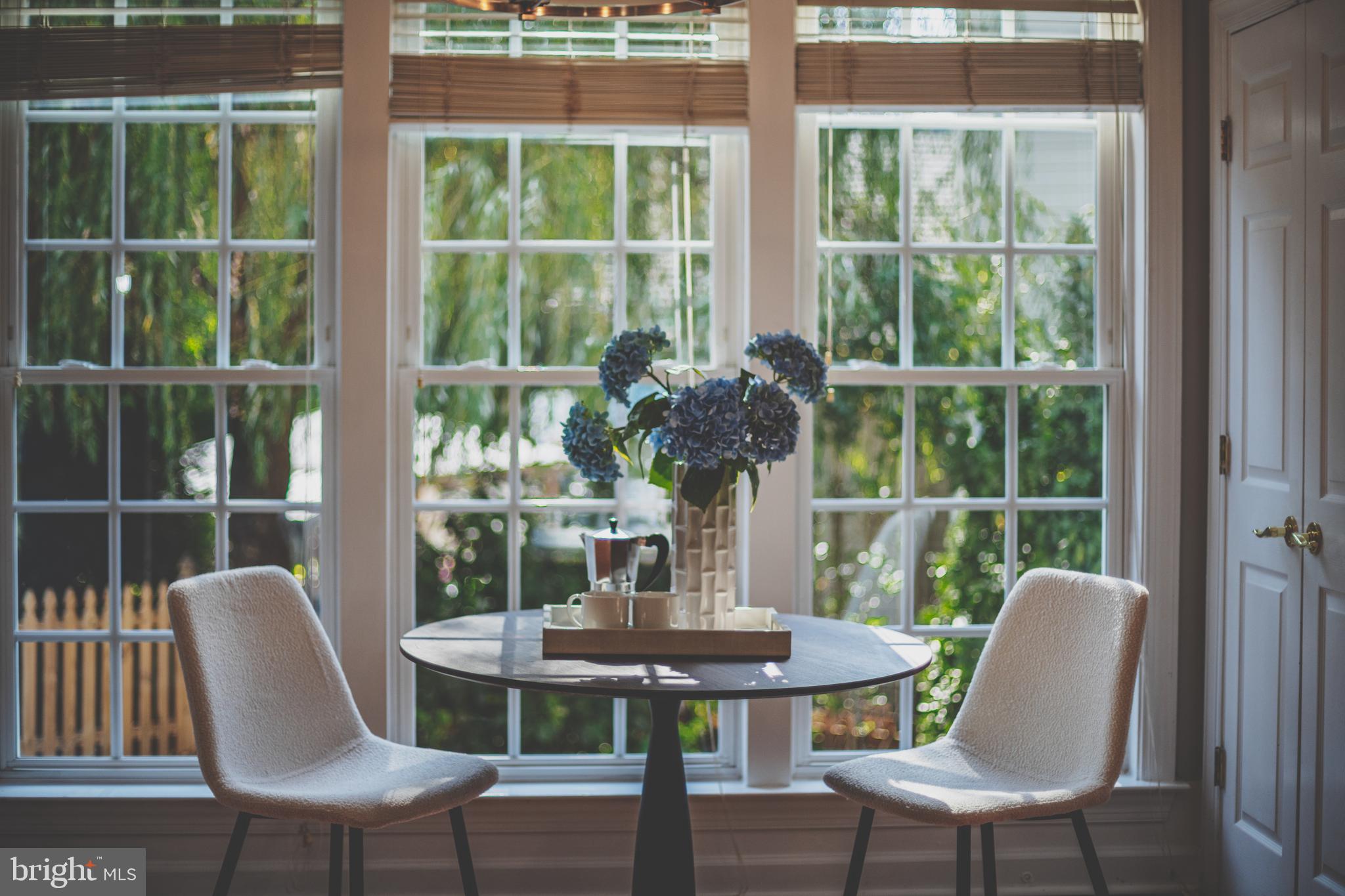 19111 Chartier Drive Leesburg, VA 20176 - Photo 57 of 68 a view of a dining room with furniture window and outside view