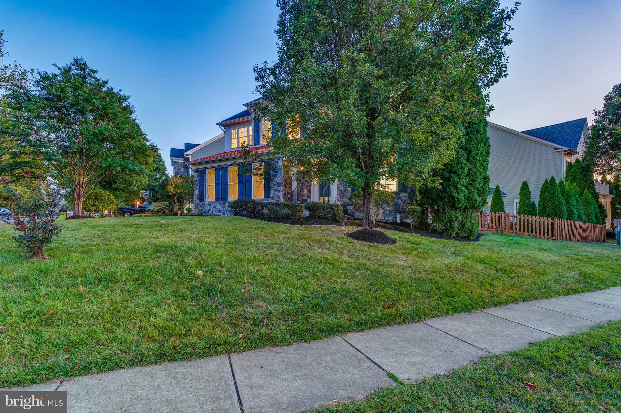 19111 Chartier Drive Leesburg, VA 20176 - Photo 65 of 68 a view of a yard in front of a house