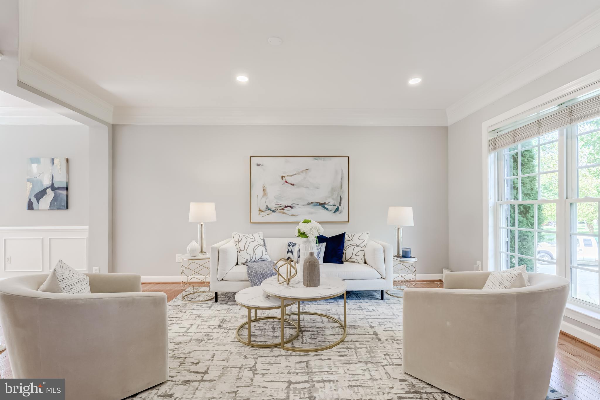 19111 Chartier Drive Leesburg, VA 20176 - Photo 8 of 68 a living room with furniture and a large window
