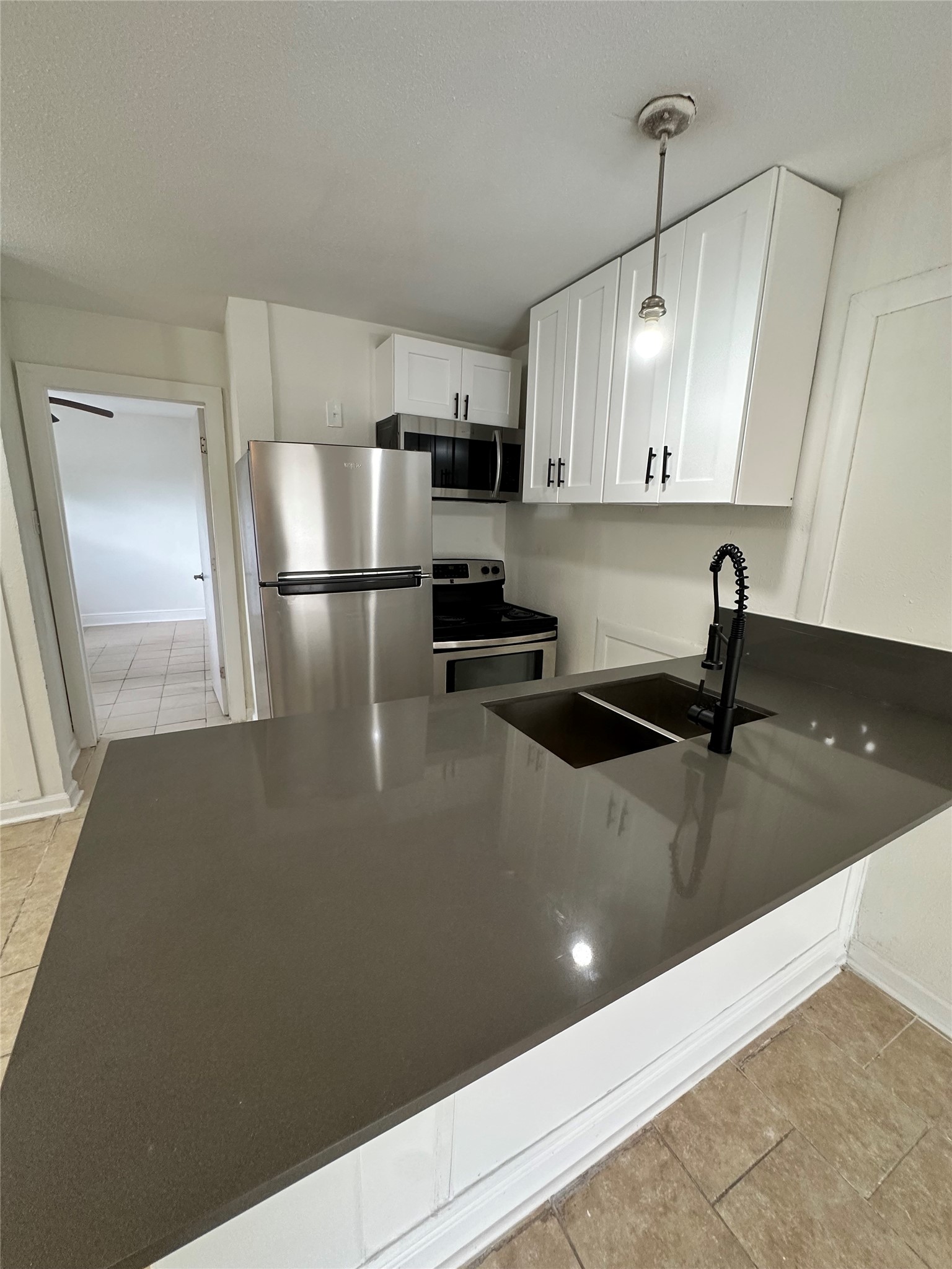 7610 Red Robin Lane Houston, TX 77075 - Photo 8 of 21 Unit 2. Kitchen plenty of space for barstools; Unit 2
