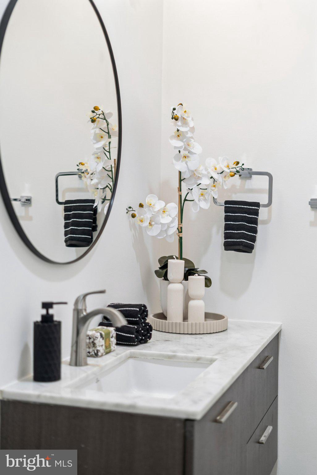 1837 Kalorama Road Northwest, Unit F Washington, DC 20009 - Photo 16 of 42 Elegant bathroom with modern accents.