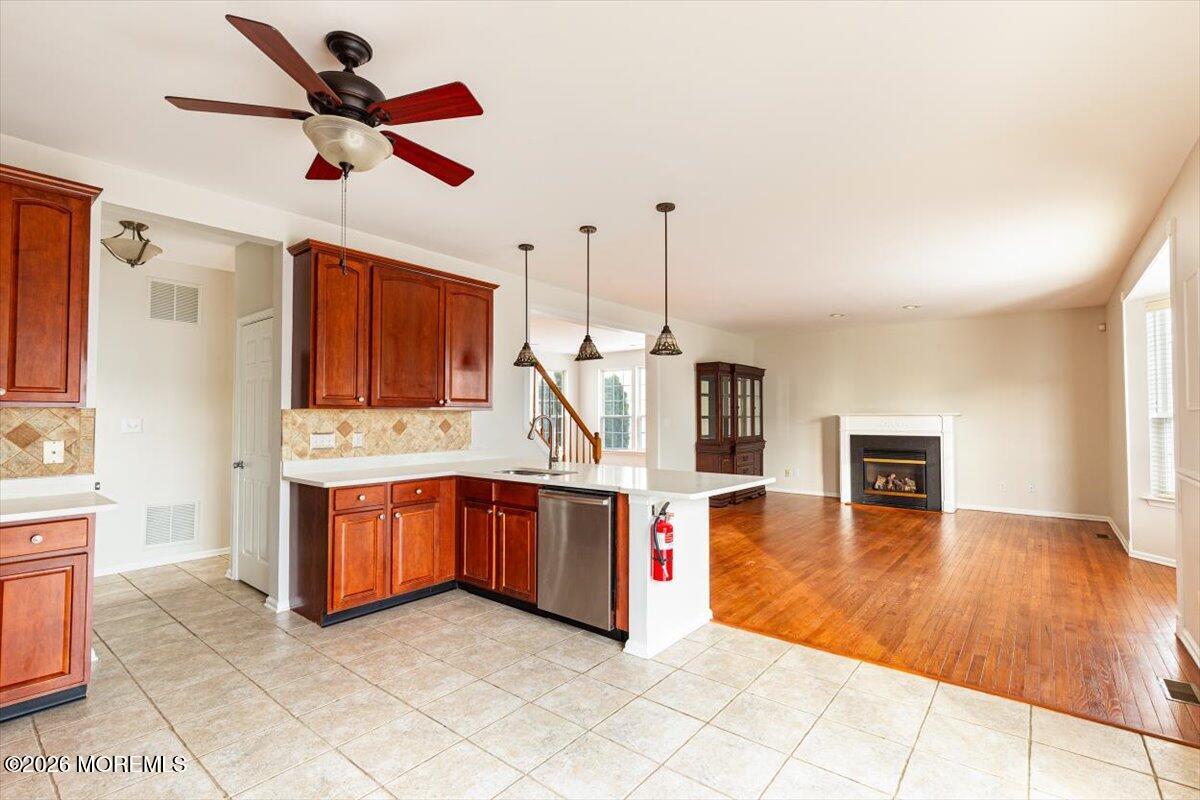 10 Hemingway Lane Columbus, NJ 08022 - Photo 11 of 50 a large kitchen with stainless steel appliances granite countertop a stove and a sink with cabinets