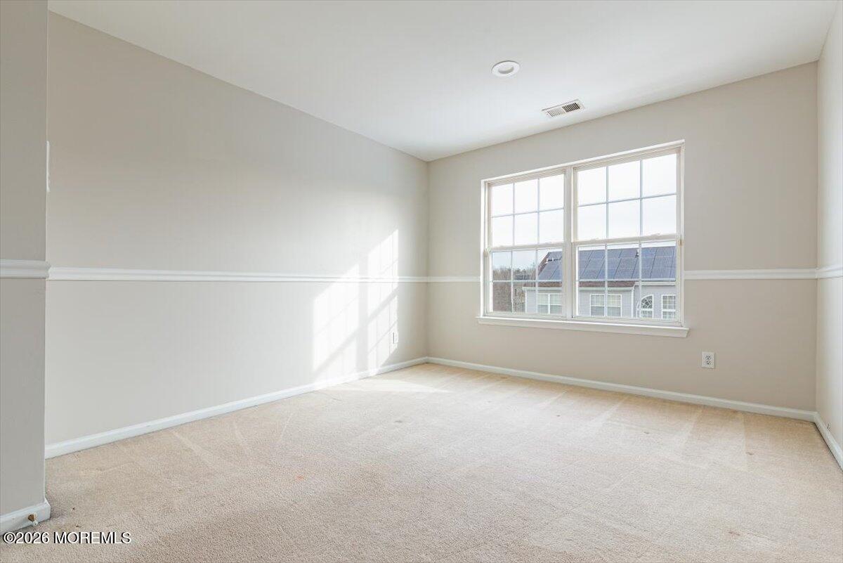 10 Hemingway Lane Columbus, NJ 08022 - Photo 31 of 50 a view of an empty room with a window