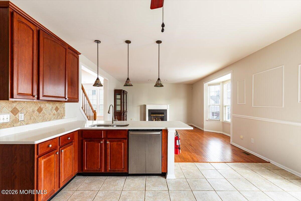 10 Hemingway Lane Columbus, NJ 08022 - Photo 10 of 50 a kitchen with stainless steel appliances granite countertop a sink counter space cabinets and a window