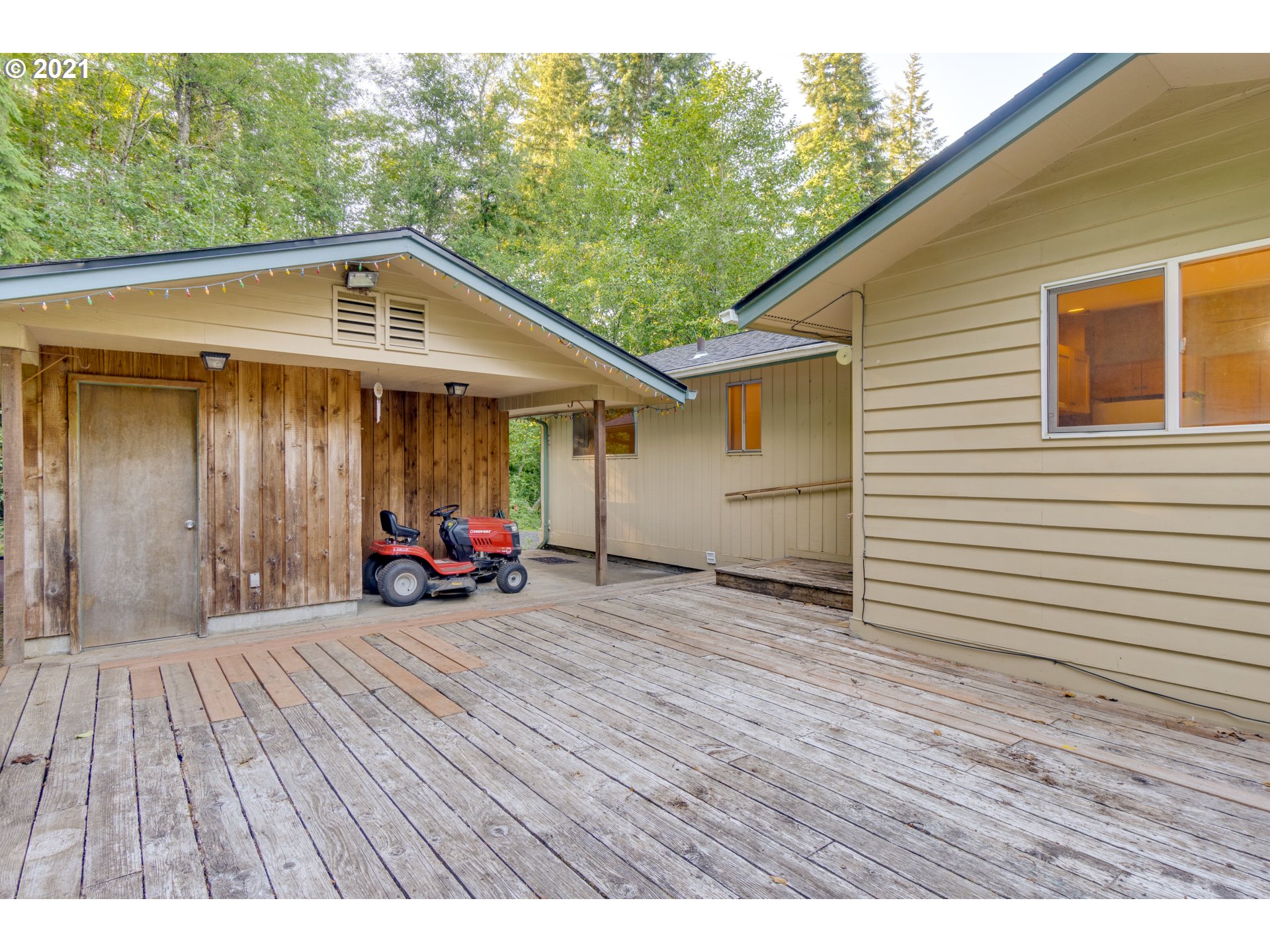 531 Oak Point Road Longview, WA 98632 - Photo 29 of 29 a view of a house with wooden floor and fence