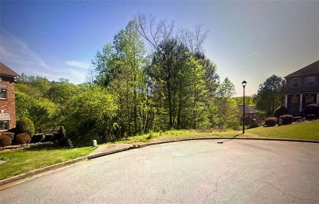 4394 Donna Way Lithonia, GA 30038 - Photo 2 of 3 a view of a street with a building in the background