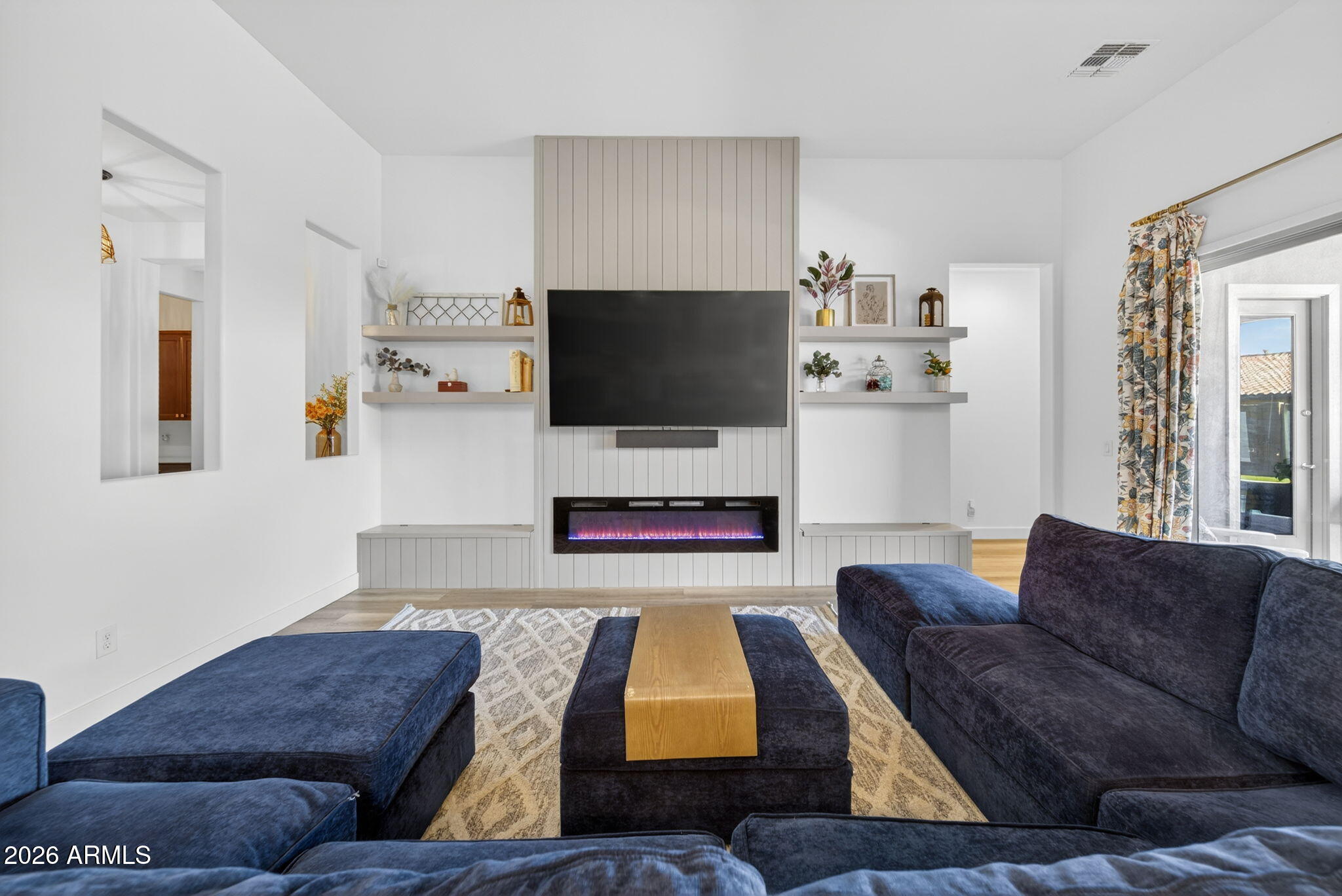9932 East Rotation Drive Mesa, AZ 85212 - Photo 17 of 62 a living room with furniture and a flat screen tv