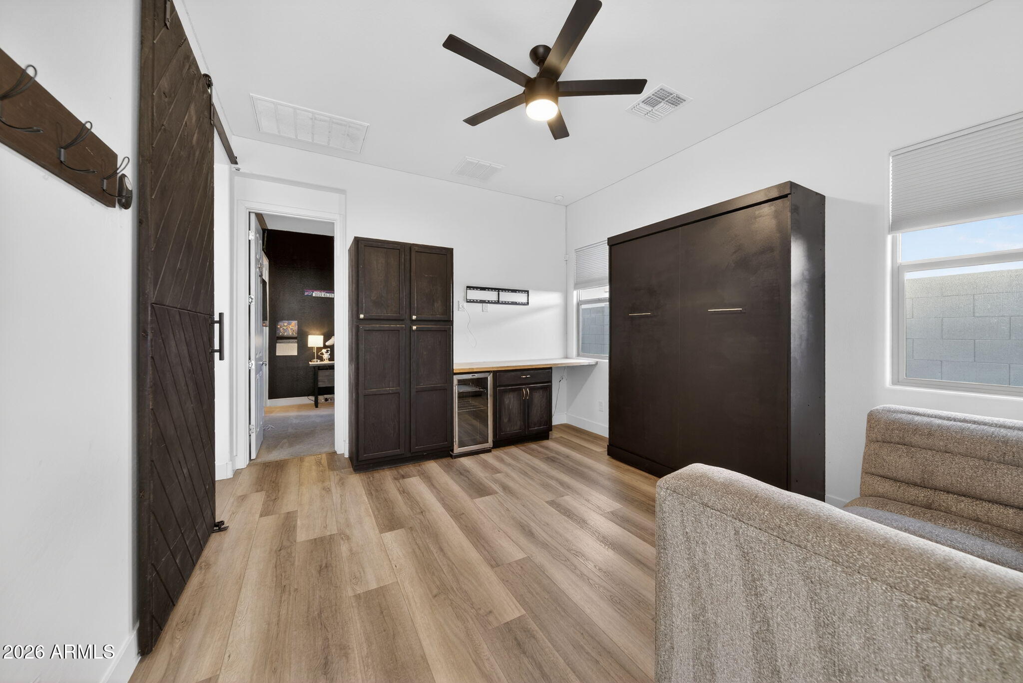 9932 East Rotation Drive Mesa, AZ 85212 - Photo 35 of 62 a view of a kitchen with a sink and refrigerator