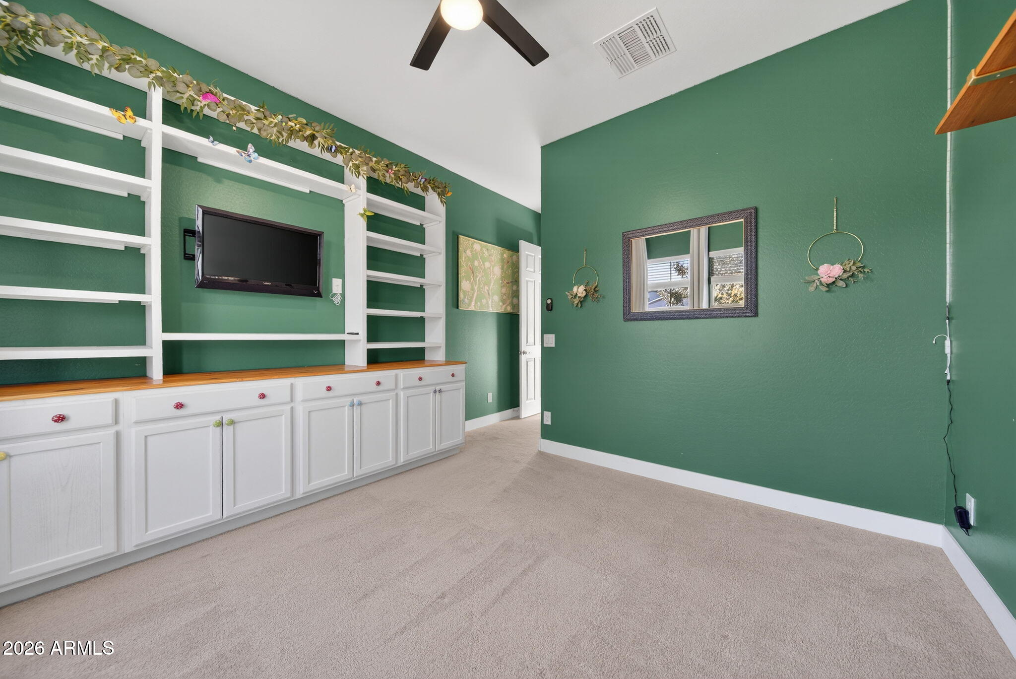 9932 East Rotation Drive Mesa, AZ 85212 - Photo 40 of 62 a view of an empty room with window and cabinet