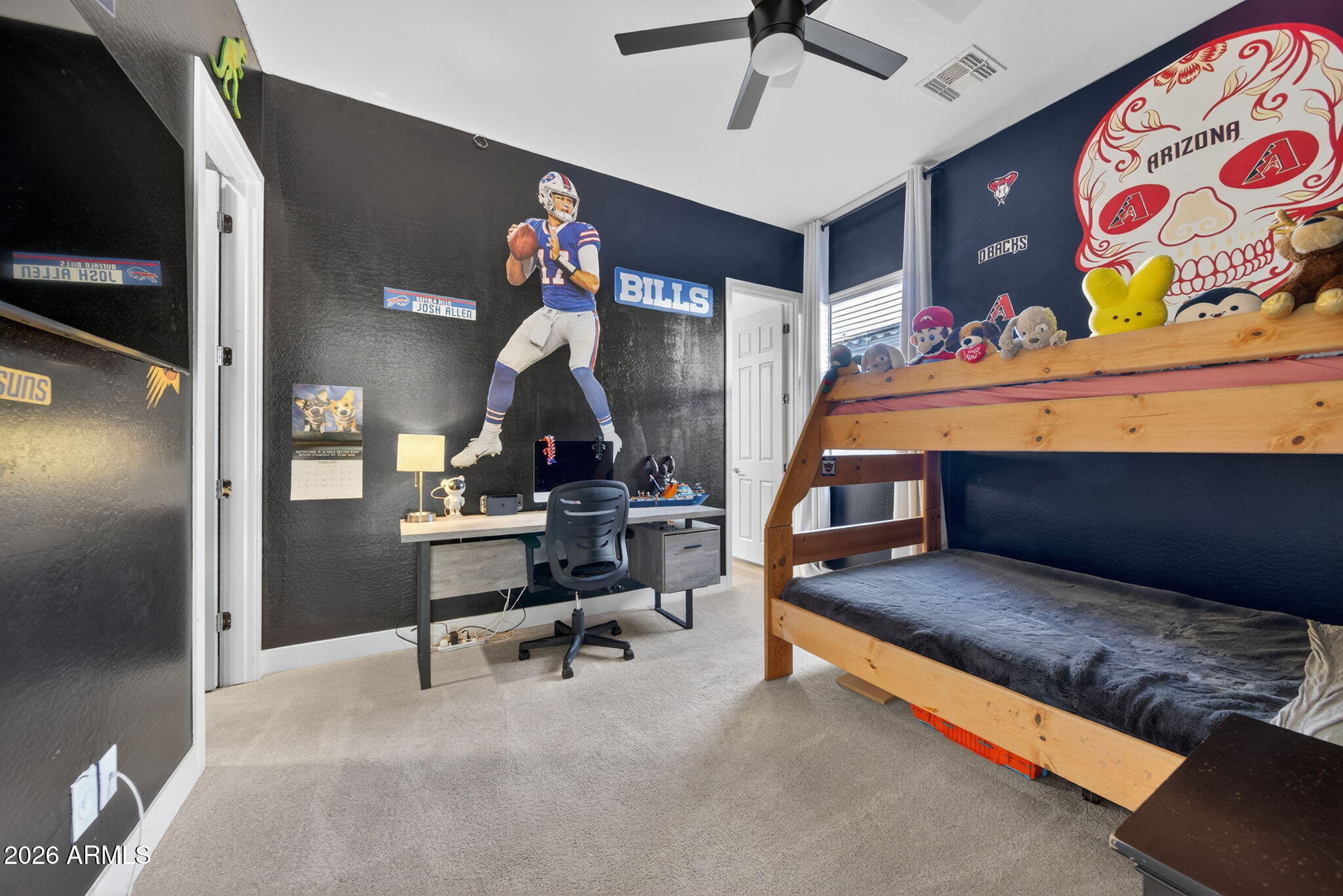 9932 East Rotation Drive Mesa, AZ 85212 - Photo 41 of 62 a bedroom with furniture and a flat screen tv