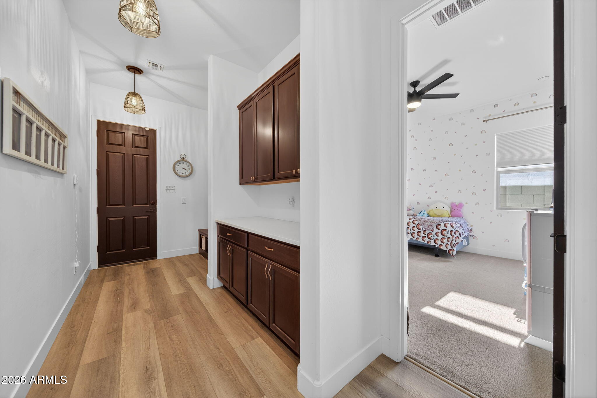 9932 East Rotation Drive Mesa, AZ 85212 - Photo 46 of 62 a en suite bathroom with a sink and a mirror