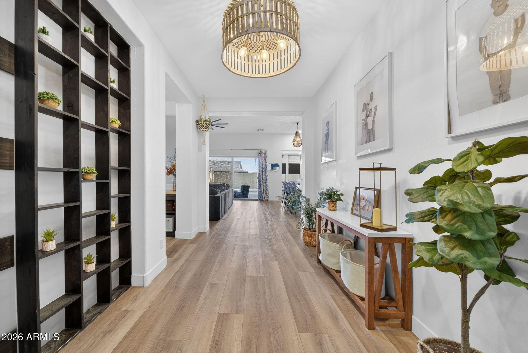 9932 East Rotation Drive Mesa, AZ 85212 - Photo 5 of 62 a view of an entryway with wooden floor