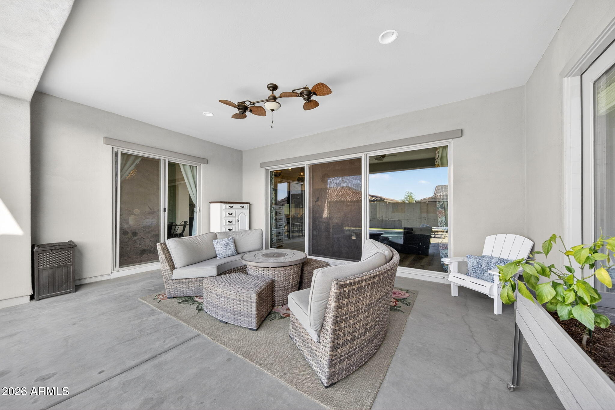 9932 East Rotation Drive Mesa, AZ 85212 - Photo 53 of 62 a living room with furniture and a large window