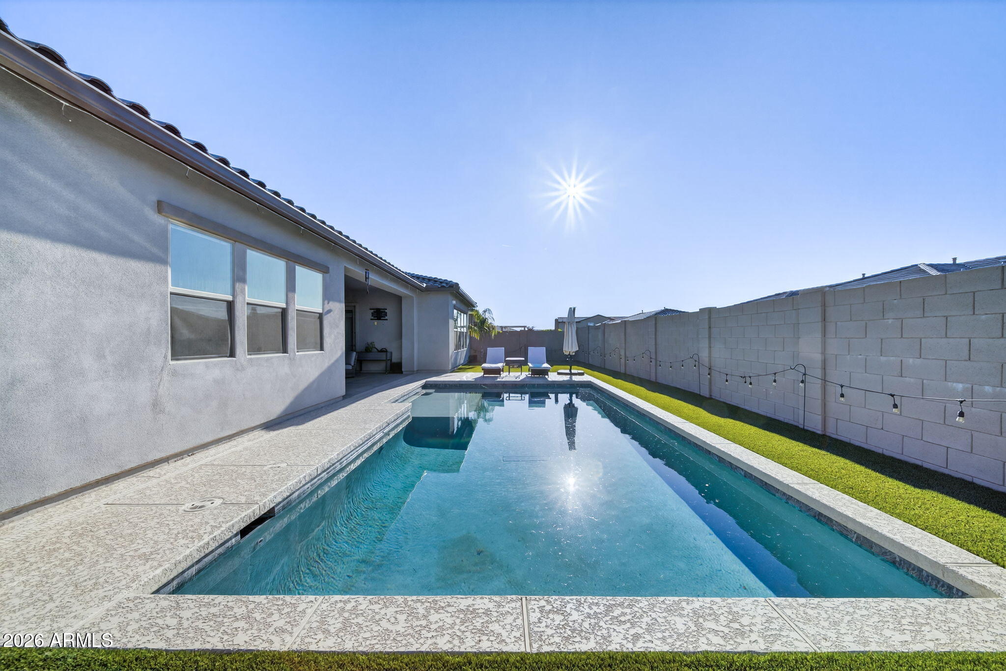 9932 East Rotation Drive Mesa, AZ 85212 - Photo 55 of 62 a swimming pool with outdoor seating