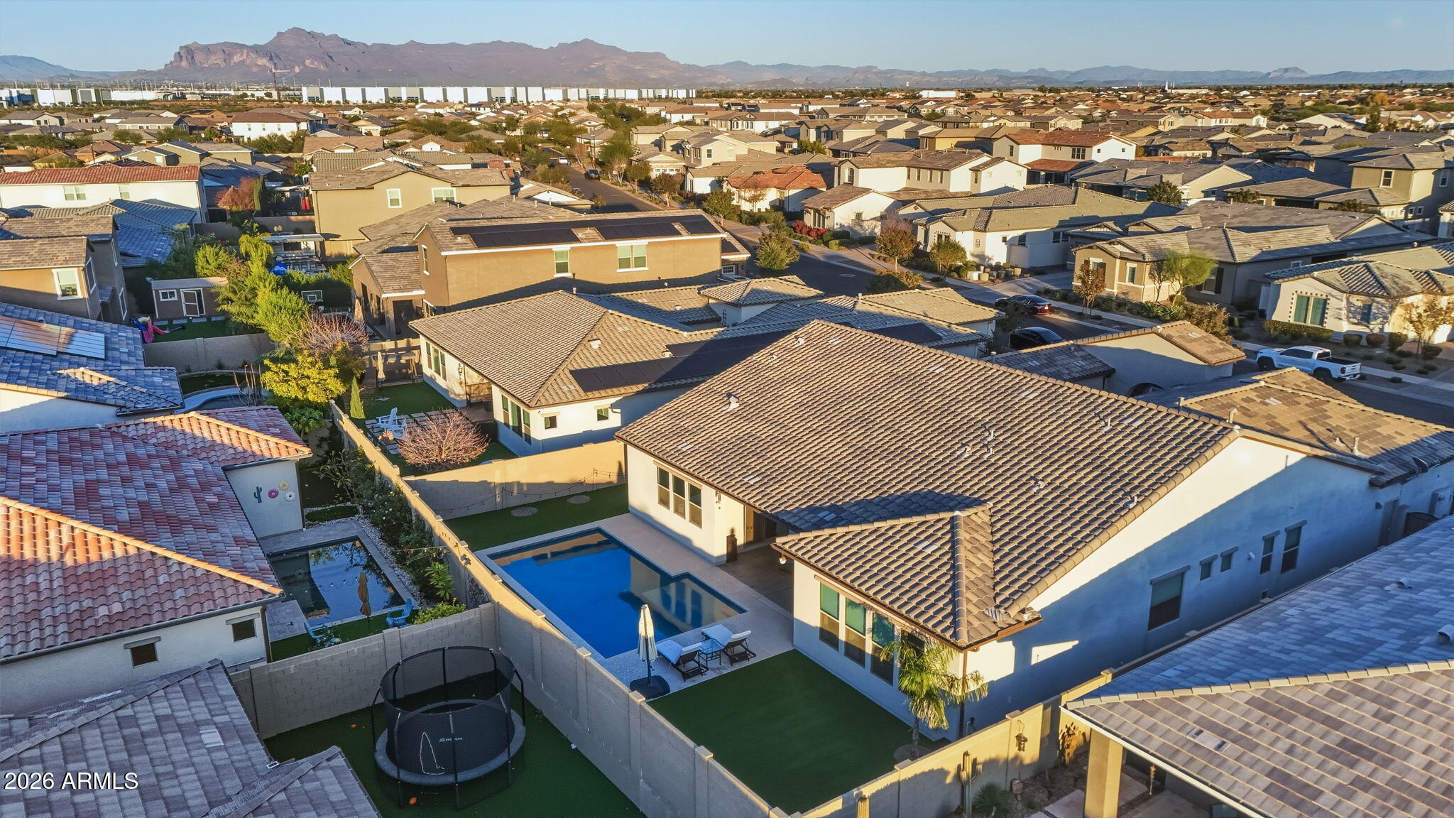 9932 East Rotation Drive Mesa, AZ 85212 - Photo 62 of 62 an aerial view of multiple houses with a yard