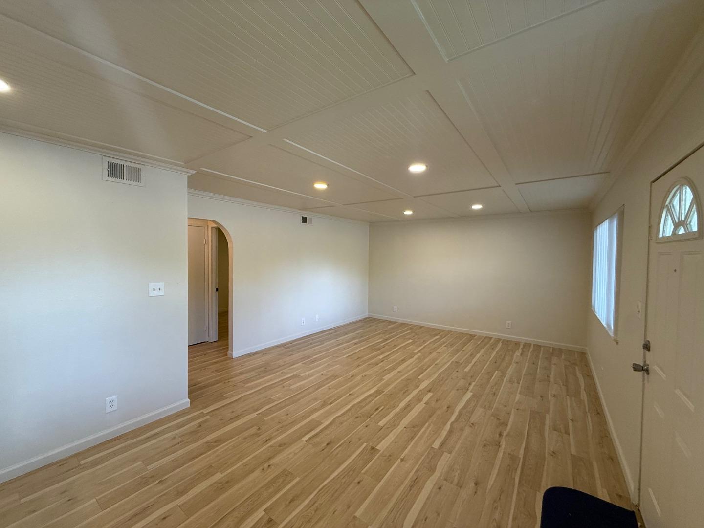 2505 Prescott Road, Unit 1 Modesto, CA 95350 - Photo 15 of 42 wooden floor in an empty room with a window