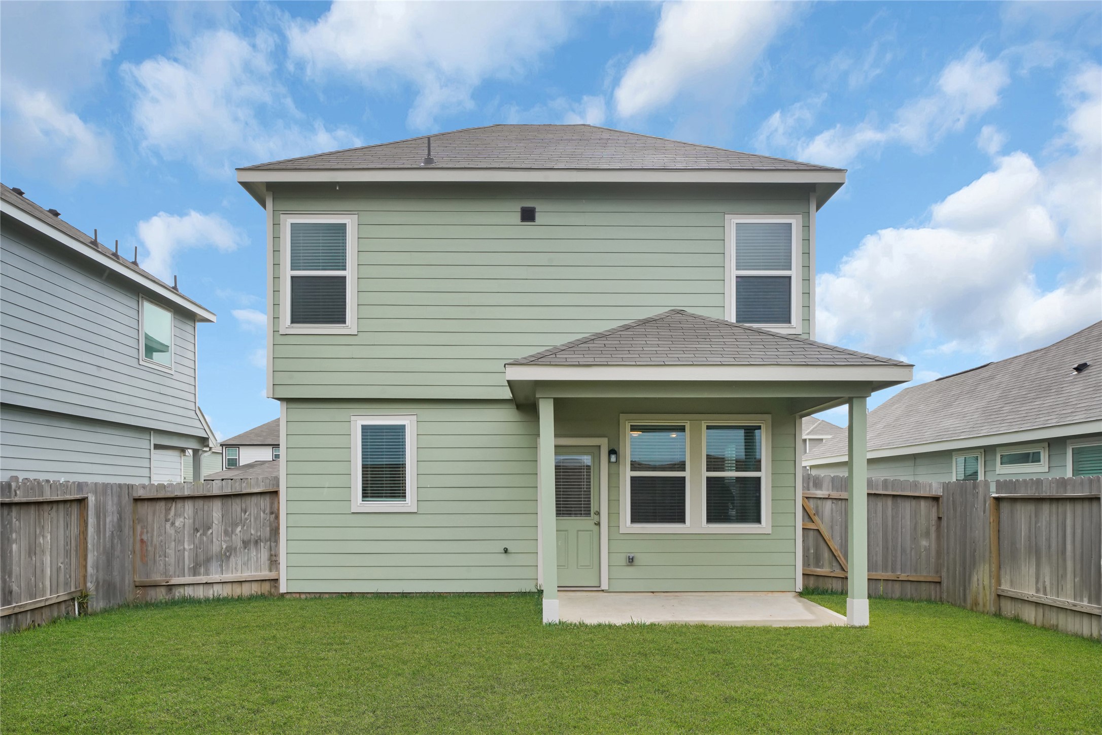 2542 Steelhead Drive Conroe, TX 77384 - Photo 18 of 20 If you enjoy relaxing outdoors or hosting barbecues, look no further! This backyard is as spacious as it is green.