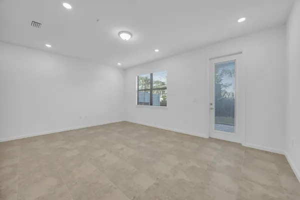 an empty room with windows