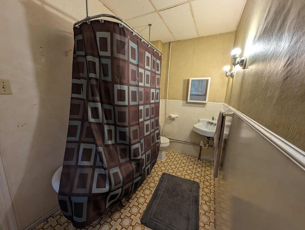 483 Stafford Road Fall River, MA 02721 - Photo 16 of 31 a bathroom with a toilet and a shower