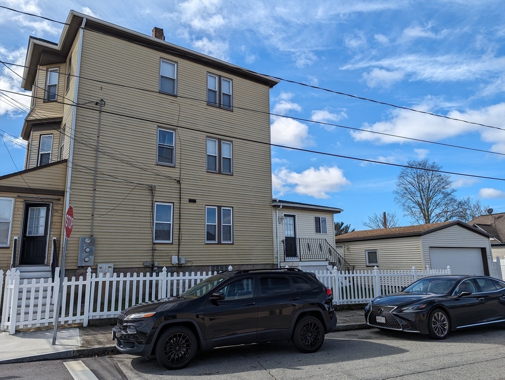 483 Stafford Road Fall River, MA 02721 - Photo 2 of 31 a car parked in front of a house