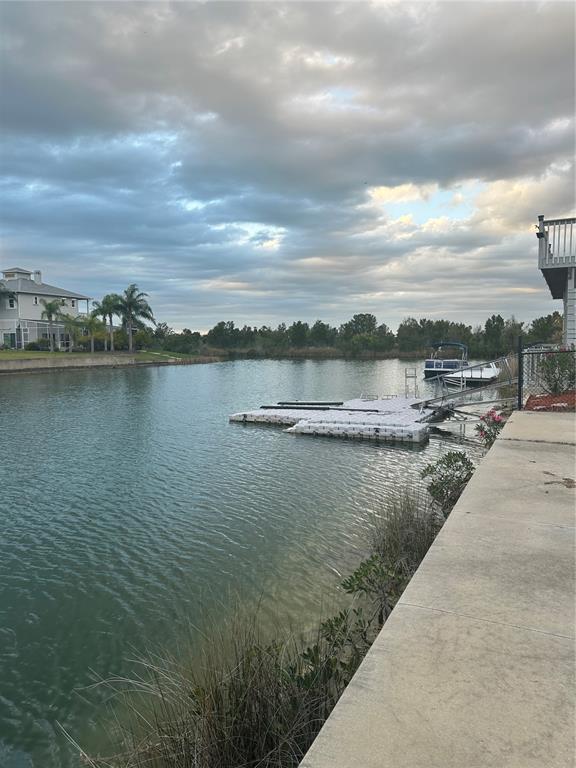3377 Oleander Drive Hernando Beach, FL 34607 - Photo 14 of 22 a view of a lake with a city