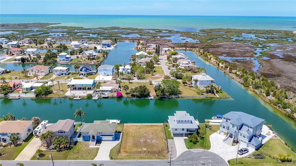 3377 Oleander Drive Hernando Beach, FL 34607 - Photo 2 of 22 an aerial view of a house with a ocean view