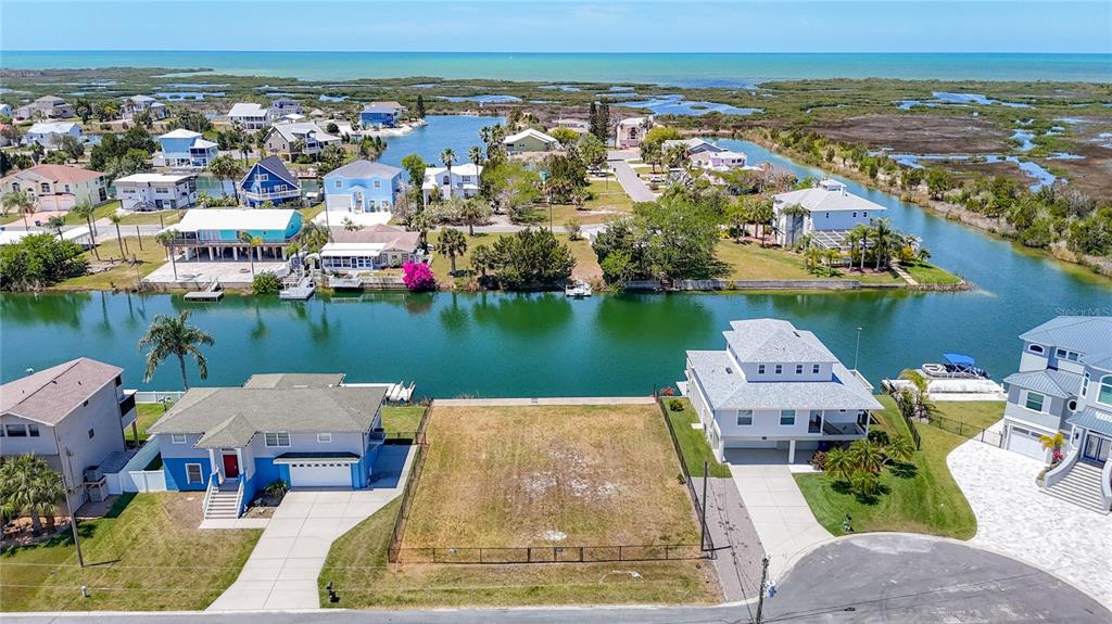3377 Oleander Drive Hernando Beach, FL 34607 - Photo 3 of 22 an aerial view of a house with outdoor space