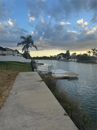 a view of a lake with a big yard