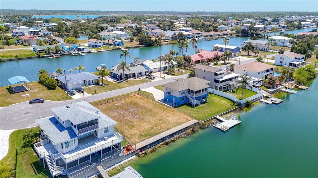 3377 Oleander Drive Hernando Beach, FL 34607 - Photo 8 of 22 an aerial view of a house with a ocean view