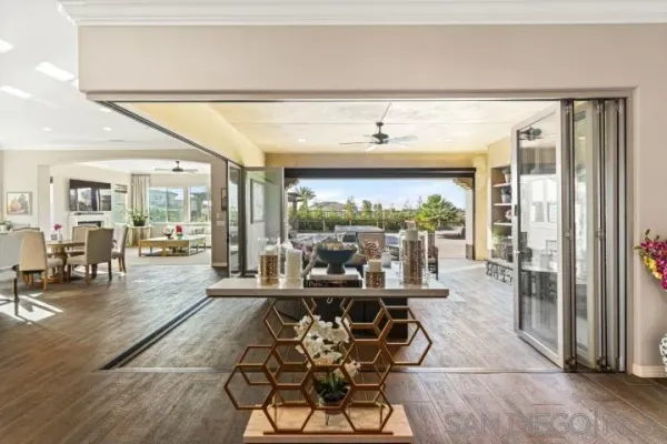 a living room with granite countertop furniture and a large window